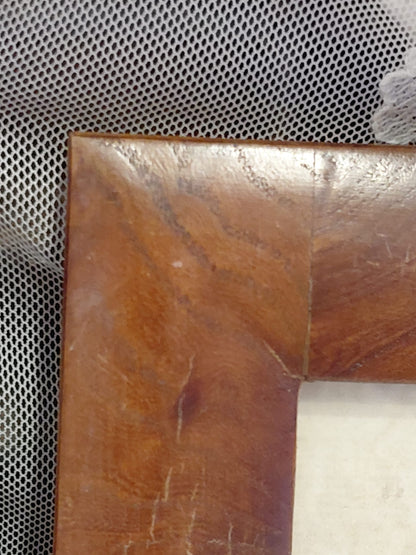 Quadri con cornice in legno